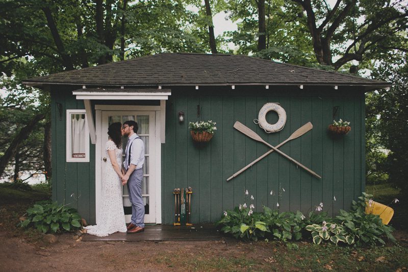 wedding photos outside a cabin at Camp Wandawega in wisconsin